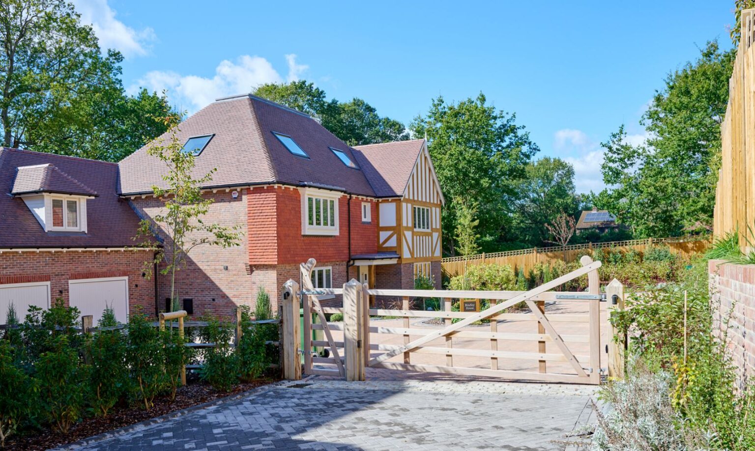 Gated modern house with garden